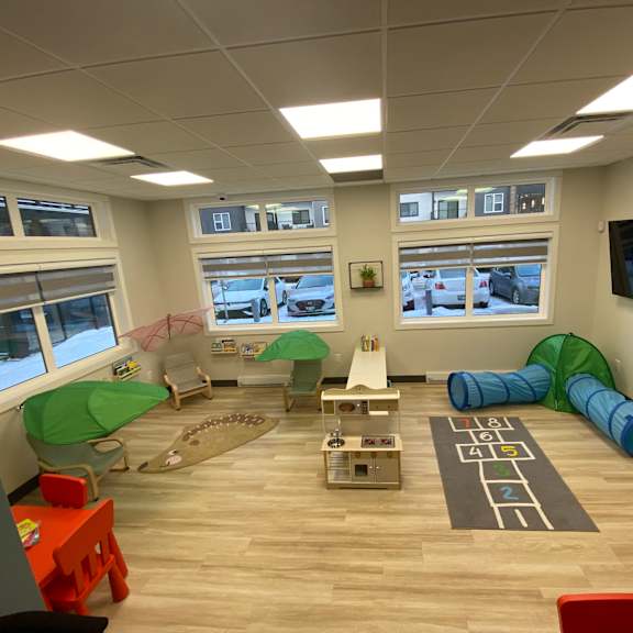 a room with a lot of toys for children to play with.