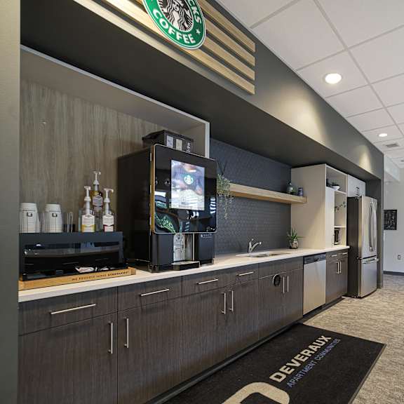 starbucks coffee machine on a counter.