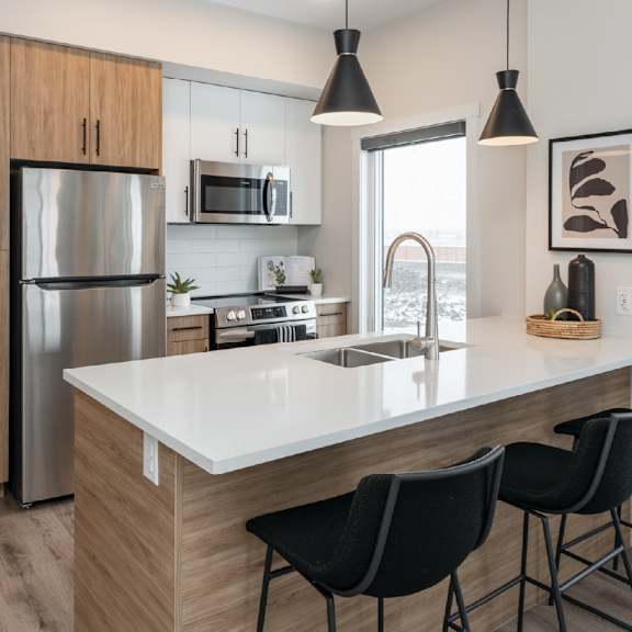 gourmet kitchen at latitude 49 townhomes, winnipeg, mb r3x 0m1