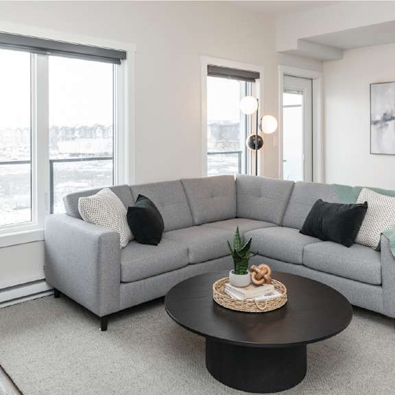 living room sofa at latitude 49 townhomes, manitoba, r3x 0m1