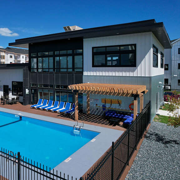 exterior - wide shot of swimming pool and clubhouse