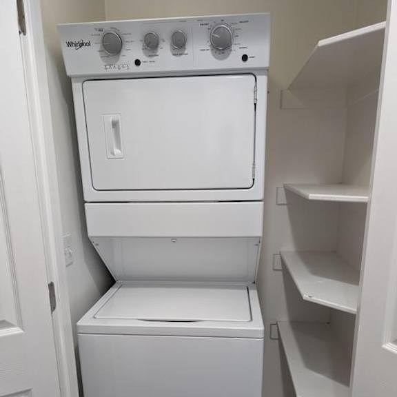a white whiting dishwasher and dryer in a kitchen.
