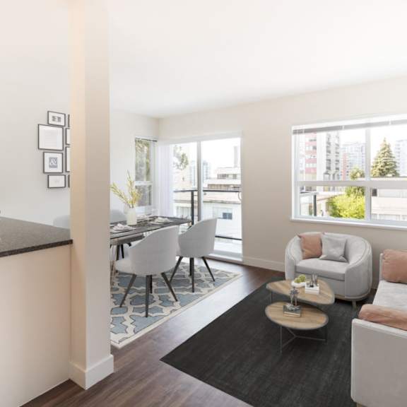 a kitchen and living room in a 555 waverly unit