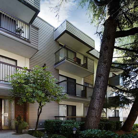 a rendering of the exterior of a building with balconies