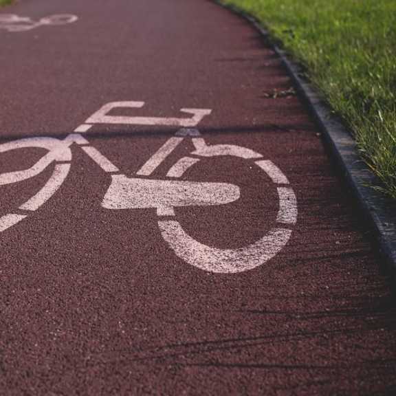 A bicycle lane is clearly marked on the pavement.