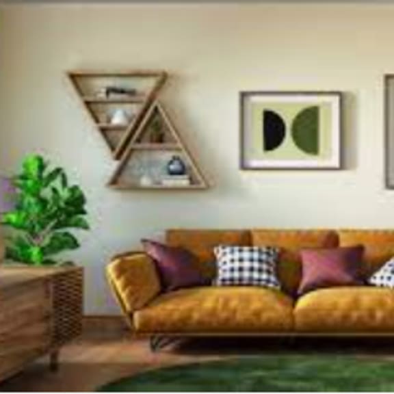 a living room with a couch and chairs