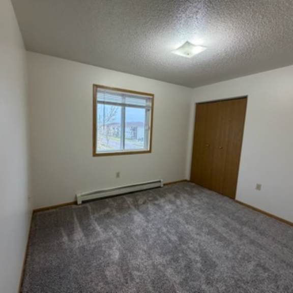 a room with a window and a door.