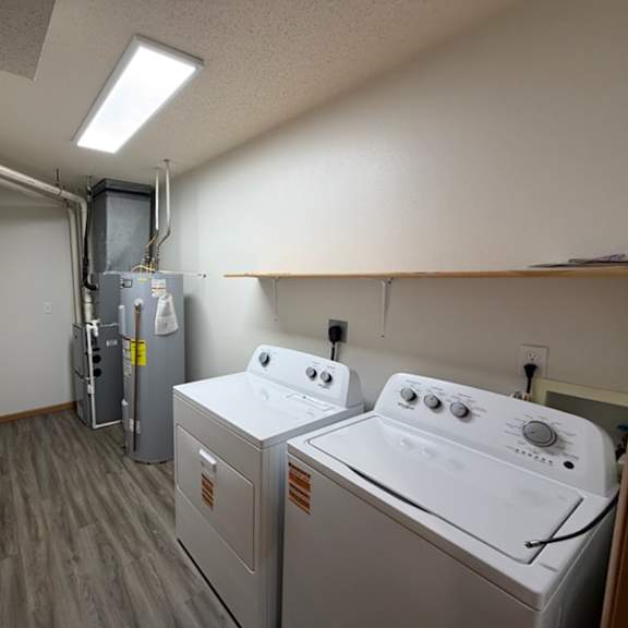 a laundry room with a washer and dryer.
