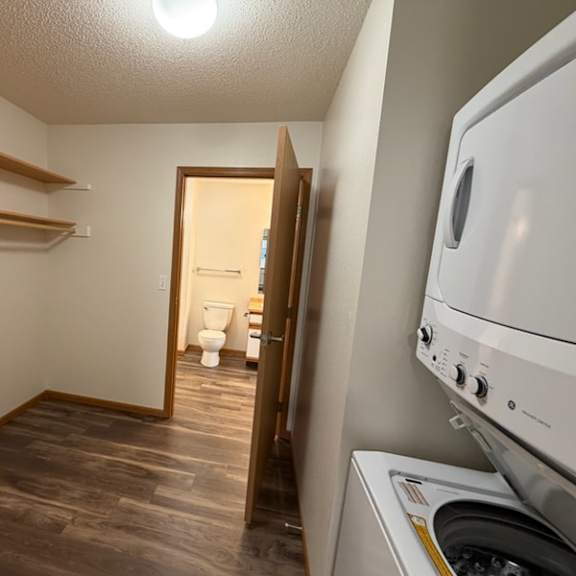 a laundry room with a washer and dryer.