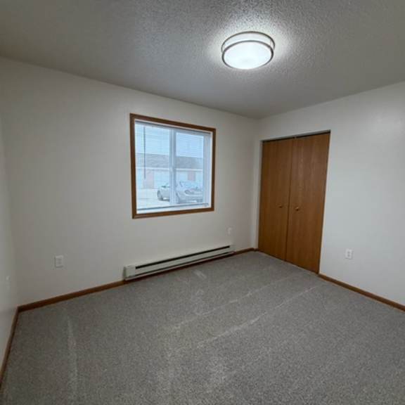 a room with a window and a door.