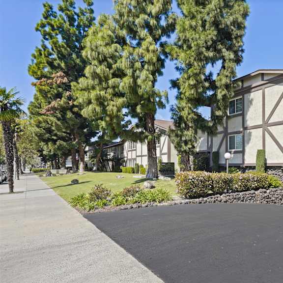 a building with a driveway in front of it.