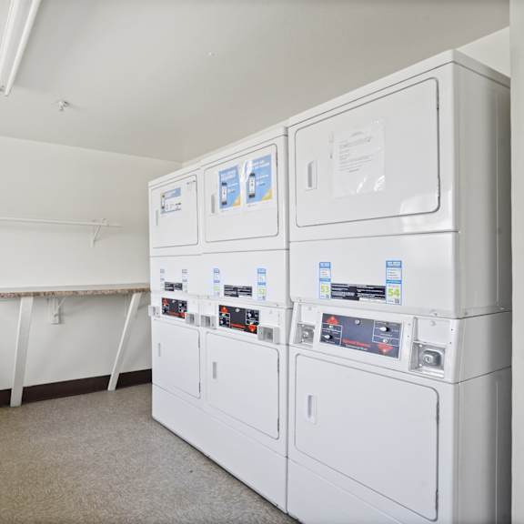 a laundry room with a washer and dryer.