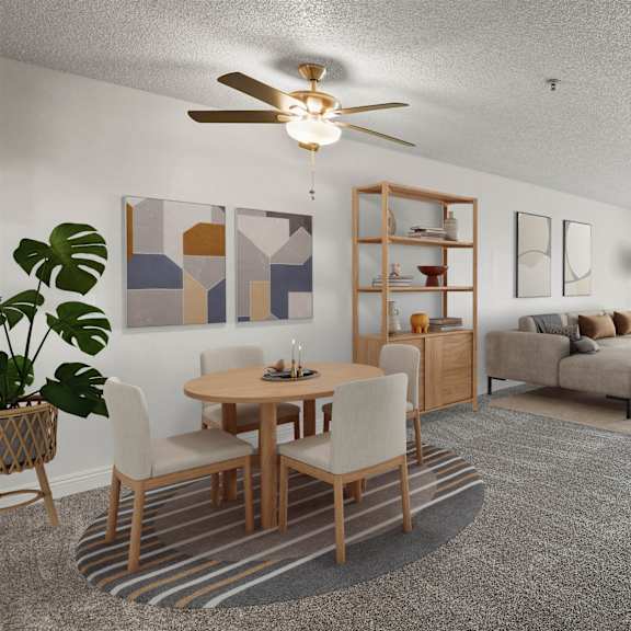 a living room with a dining table and chairs.