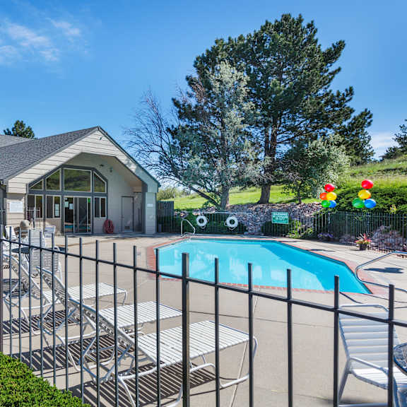 a house with a pool in the backyard.