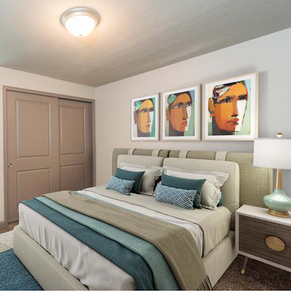 a bedroom with a bed, a chair, and a painting on the wall.