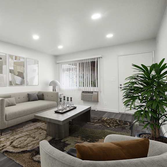 a modern living room with a white sofa, a grey armchair, a coffee table, and a rug.
