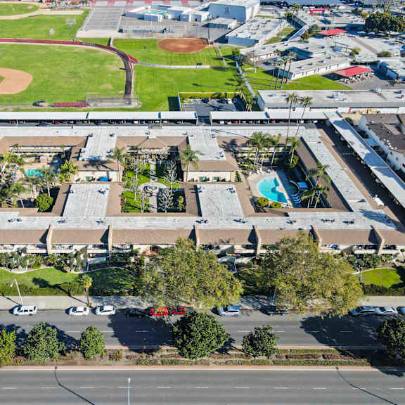 a large building with a pool in the middle of it.