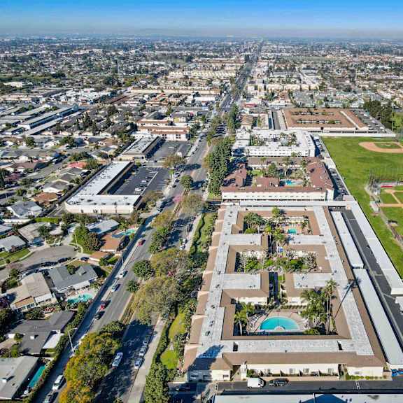 a large building with a pool in the middle of it.