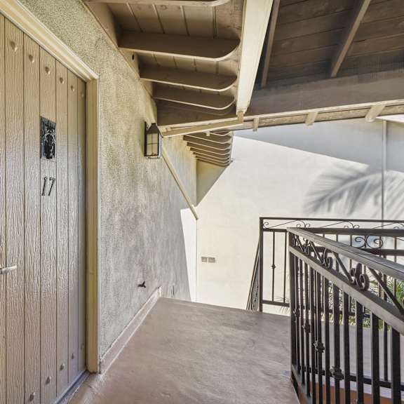 a hallway with a door numbered 17.