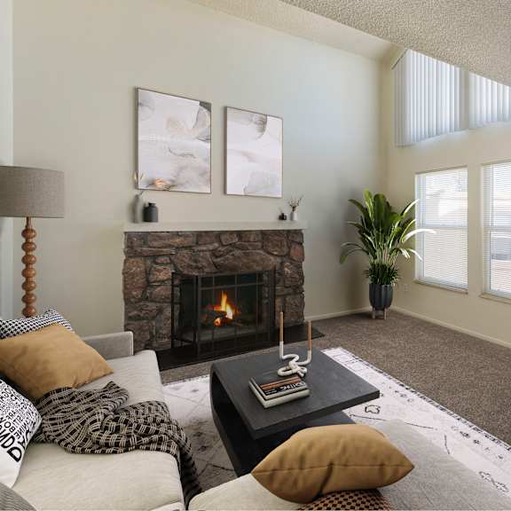 a living room with a fireplace and a couch.