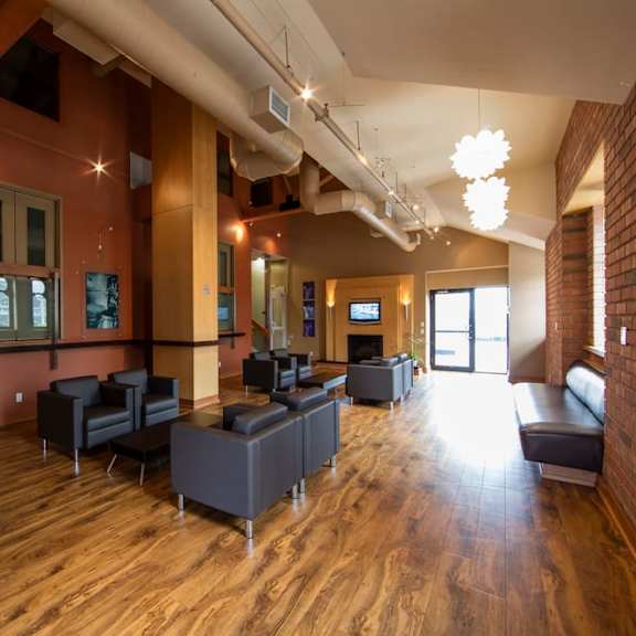 a large room with couches and chairs