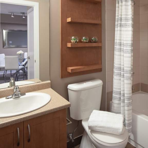 a bathroom with a toilet sink and bathtub
