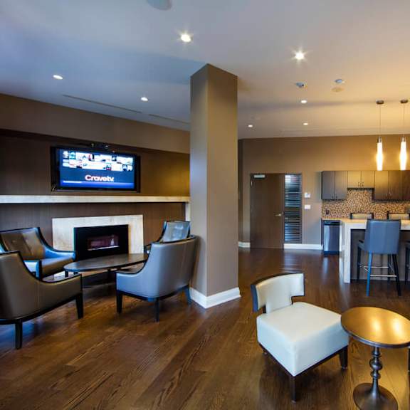 a living room filled with furniture and a fire place