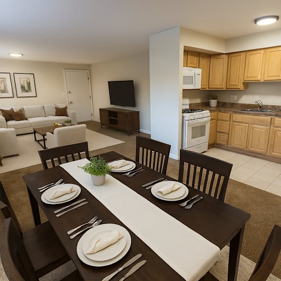 a dining room with a table set for two with a view of the kitchen.