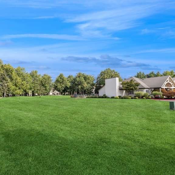 a large green lawn in front of apartments at sundial apartments, wilsonvile, oregon