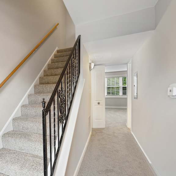 a flight of stairs leading to the first floor at the hinsdale, hinsdale, 60521