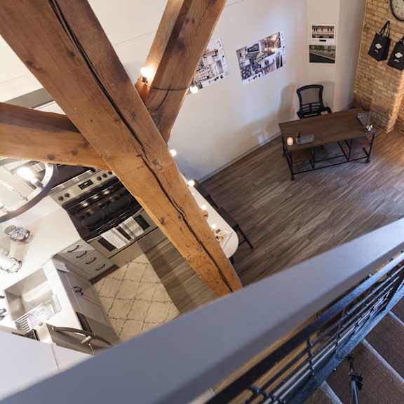 staircase leads up to living room at freightyard townhomes and flats, minneapolis, 55401