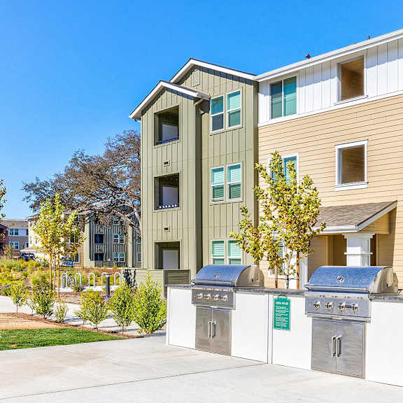 apartment exterior with view of bbq