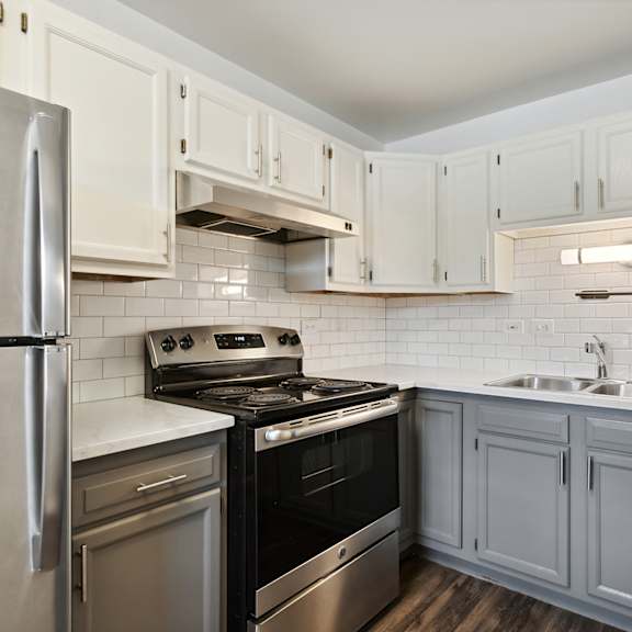 a kitchen with stainless steel appliances at the hinsdale, hinsdale, illinois