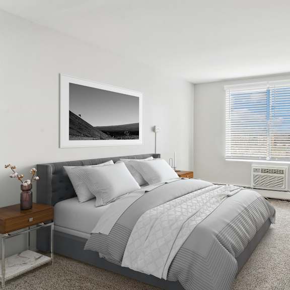 a bedroom with a large bed and a painting on the wall.
