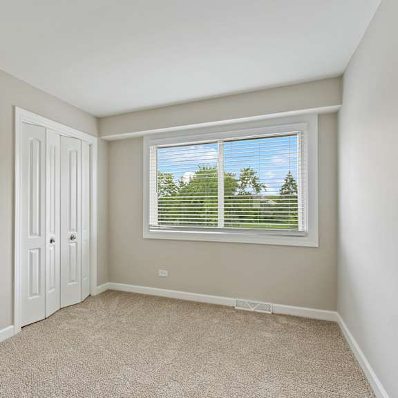 a bedroom with a window at the hinsdale, hinsdale, il, 60521