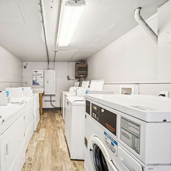 a laundry room with a washer and dryer.