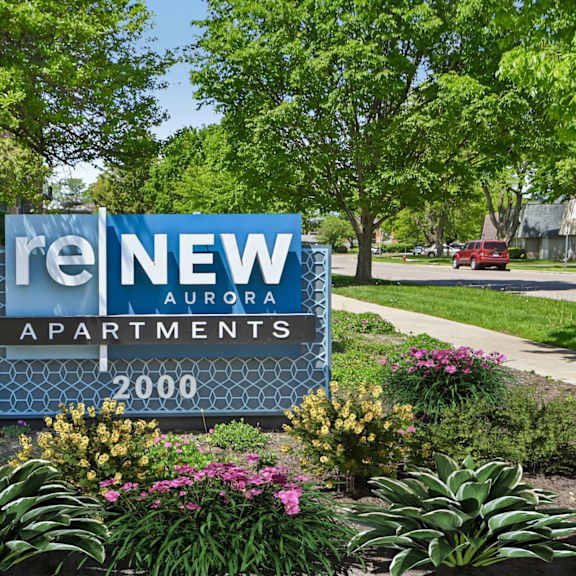a sign for renewing apartments in aurora in 2000.