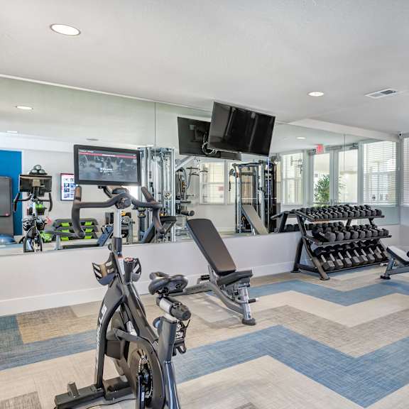 the gym at the bradley braddock road station apartments