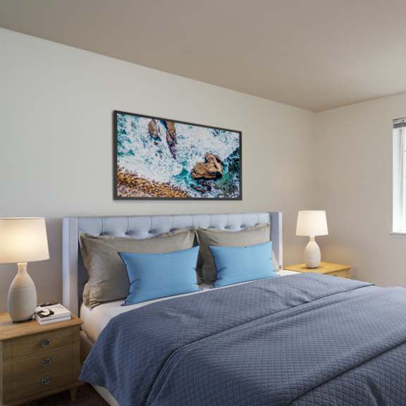 a bedroom with a bed and a window at sundial apartments, oregon