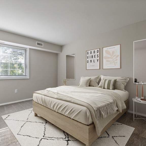 bedroom with bed and nightstand at briarwood apartments, dumfries, va, 22026