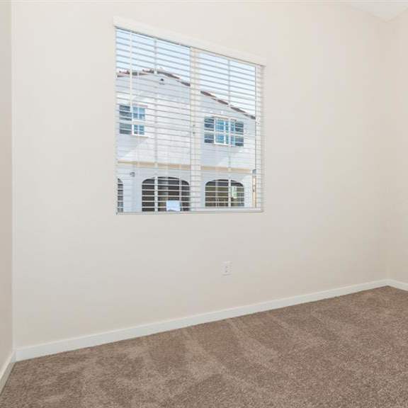 beige carpet in bedroom at arrive at rancho belago, california