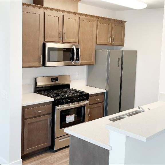 fully equipped kitchen at arrive at rancho belago, moreno valley