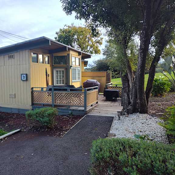 cabin with a porch and driveway at salinas sunset apartments, salinas, ca, 93907