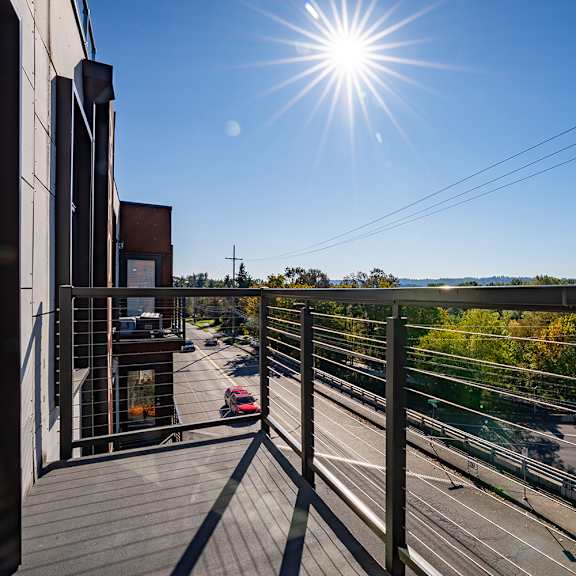 rooftop terrace with panoramic city and hillside views at brooklyn yard apartments, portland, or 97202