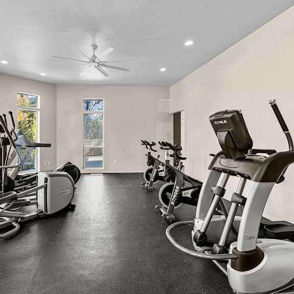 fitness center with various equipment