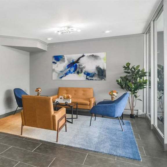 a living room with a couch and chairs and a table at renew aurora, aurora, 60506