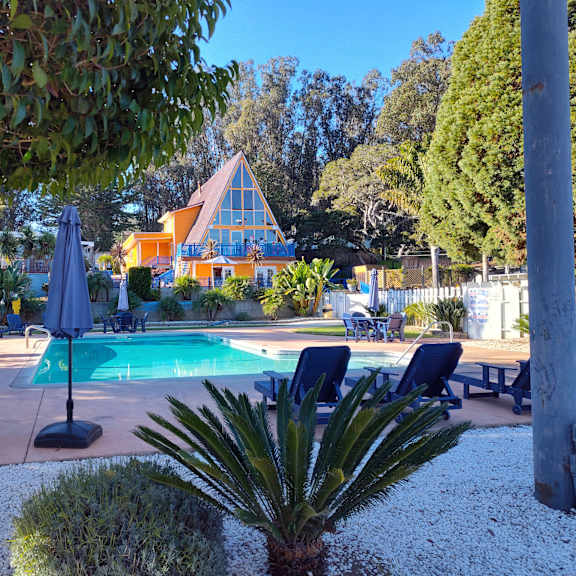 view of the pool and cabin at salinas sunset apartments, salinas, ca