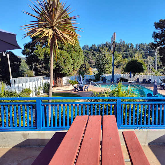 view of the pool from the deck at salinas sunset apartments, california