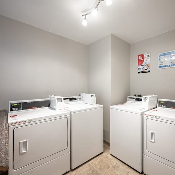 laundry room at oak park apartments, solvang, california