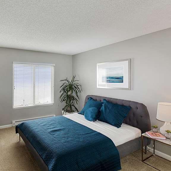 furnished bedroom interior at oceanaire apartment homes, california